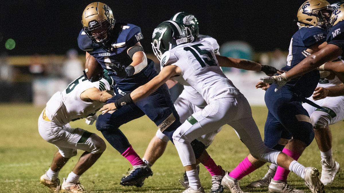 Central Catholic’s Julian Lopez runs the ball during the Valley Oak League game with Manteca at Central Catholic High School in Modesto, Calif., on Friday, Oct. 15, 2021. Central Catholic won the game 56-33.