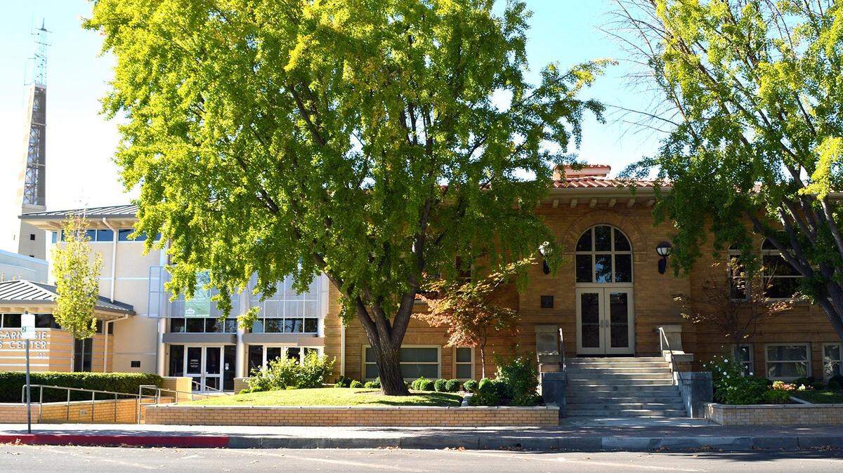 The historic Turlock Carnegie library, right, gained a modern addition, left, after a fire gutted the original 1916 structure.