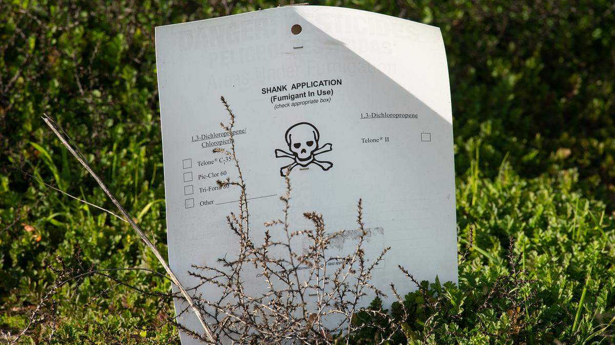 A fumigant notice is posted in a field on Shoemake Ave near Hart-Ransom Elementary School in Modesto, Calif., on Friday Jan. 21, 2022.