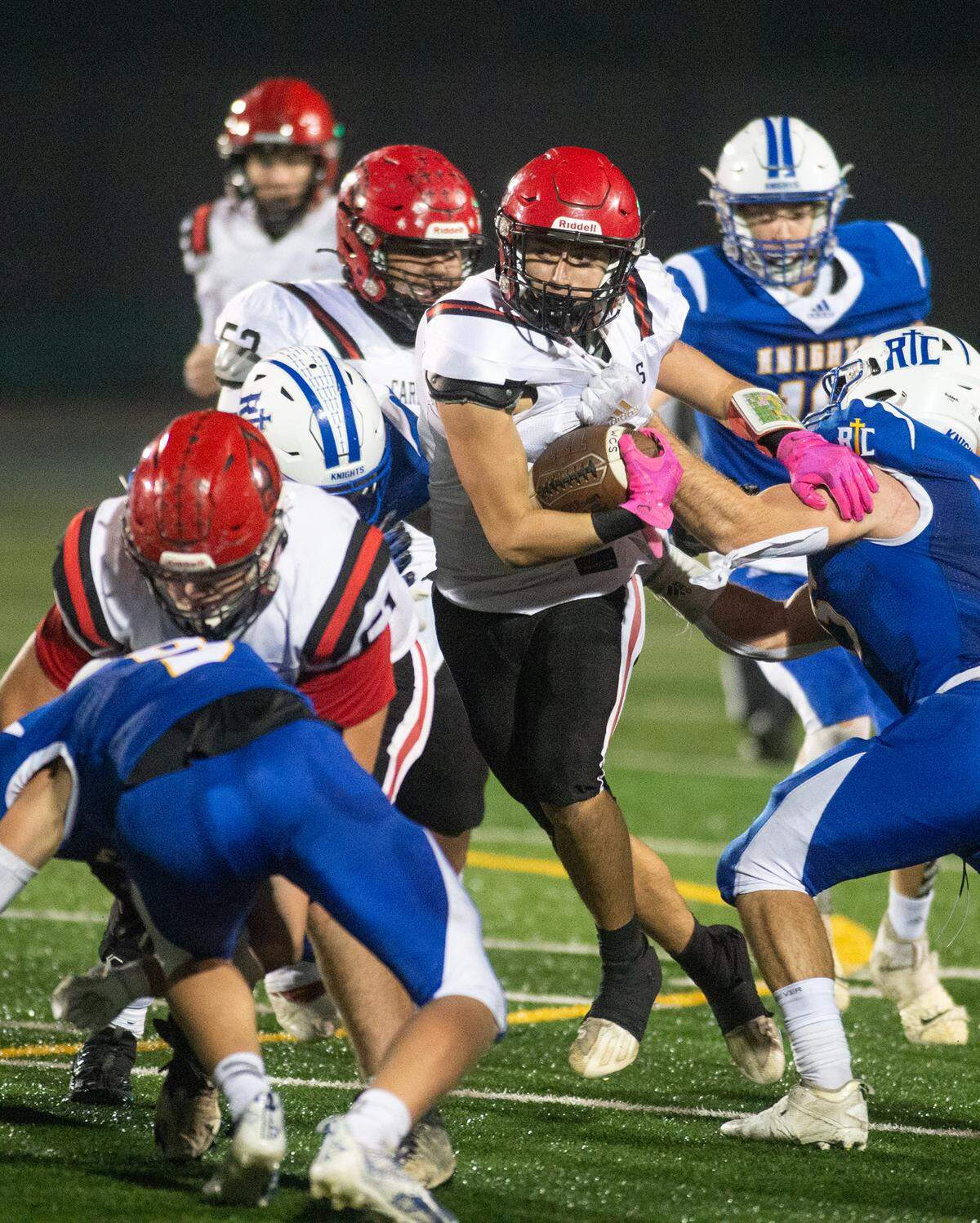 Woodland Christian’s Gabe Sanchez runs the ball during the Sac-Joaquin Section Division VII championship game with Ripon Christian at St. Mary’s High School in Stockton on Friday.
