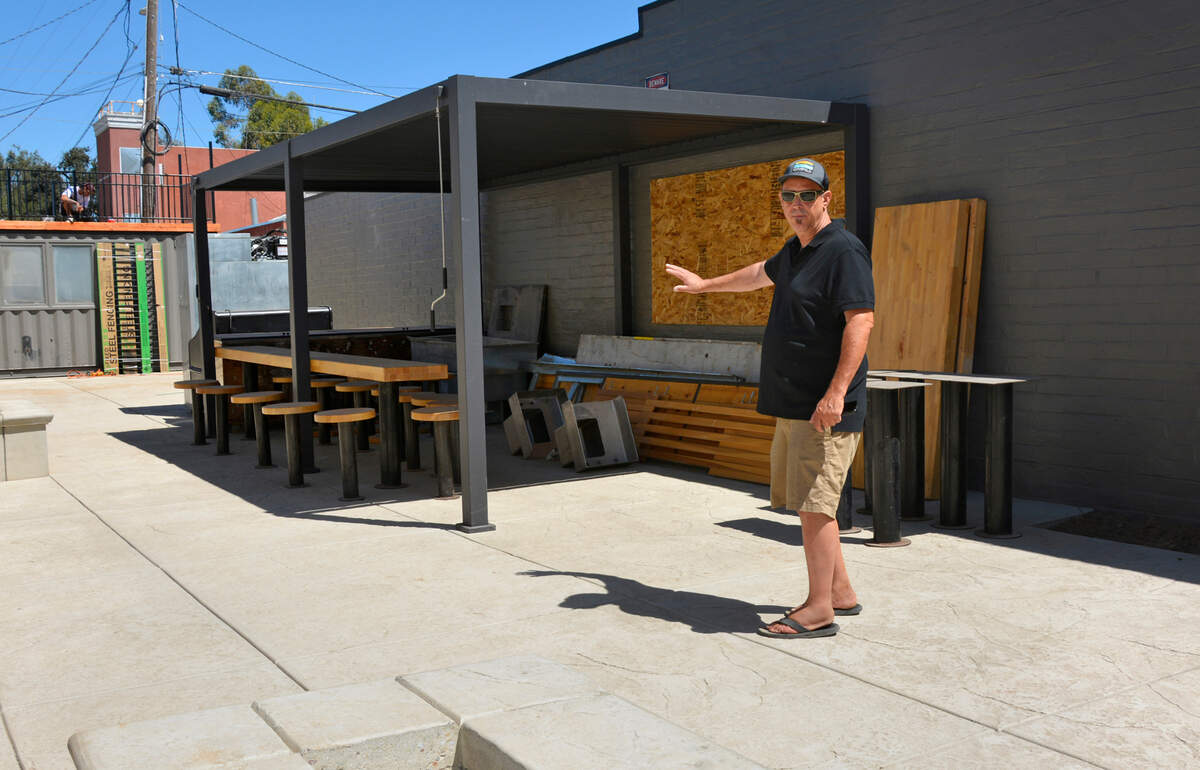 Owner Randy Rocha shows off the large outdoor patio at The Black Sheep, one of three new restaurants he is opening in downtown Riverbank, Calif. on Aug. 26, 2022.