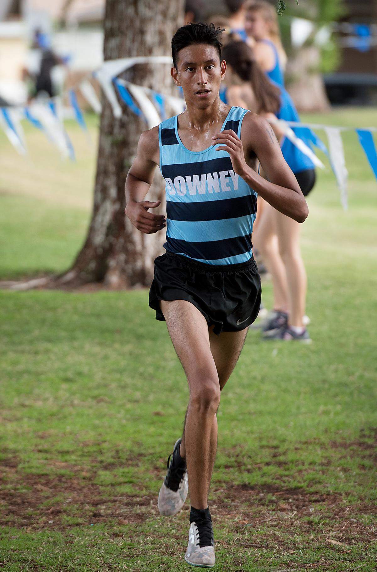 Downey runner Joel Cardoza placed third in the varsity race during the CCAL meet at Donnelly Park in Turlock, Calif., on Wednesday, Oct. 3, 2018. Cardoza finished with a time of 16:13.