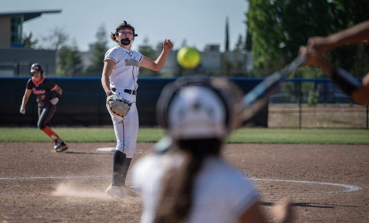 Central Catholic’s Randi Roelling gets a Merced batter to swing at a high fastball during the CIF Sac-Joaquin Section Division III softball playoffs at Central Catholic High School in Modesto, Calif., on Thursday, May 19, 2022.