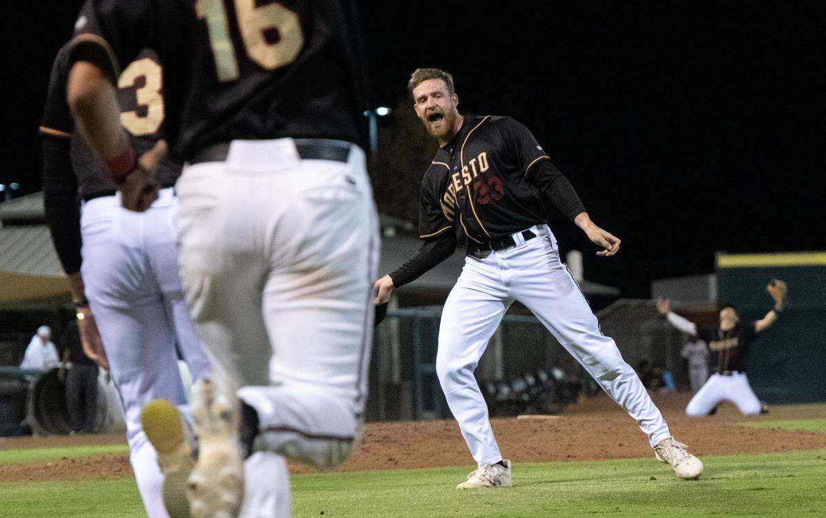 Modesto Nuts’ closer Hunter Cranton celebrates the final out to secure the California League Championship title over Lake Elsinore at John Thurman Field in Modesto, Calif., Wednesday, Sept. 18, 2024.