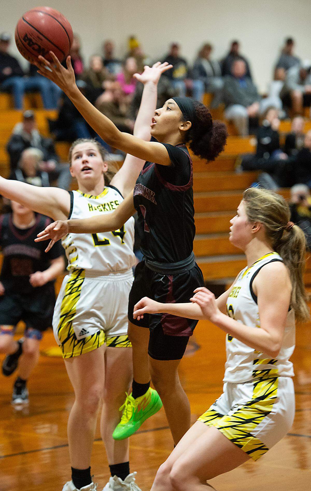 Riverbank’s Taylor Macias scores on a layup during the Trans-Valley League game with Hughson in Hughson, Calif., Tuesday, Jan. 31, 2023. Riverbank won the game 53-41.