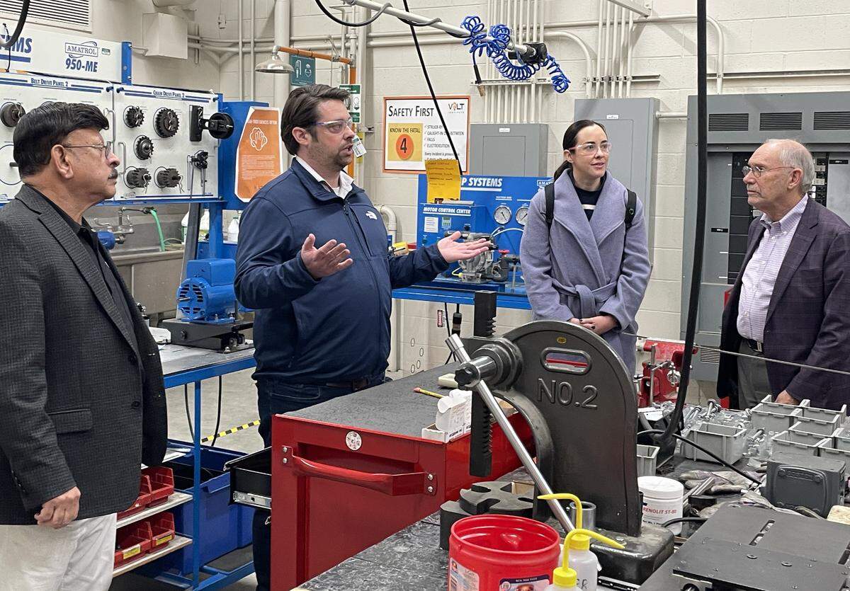 The VOLT Institute in Modesto hosted a Dec. 3 visit by the National Security Commission on Emerging Biotechnology. From left are VOLT instructor Chad Prasad, Executive Director Eric Neuenfeldt and commission members Michelle Rozo and Dov Zakheim.