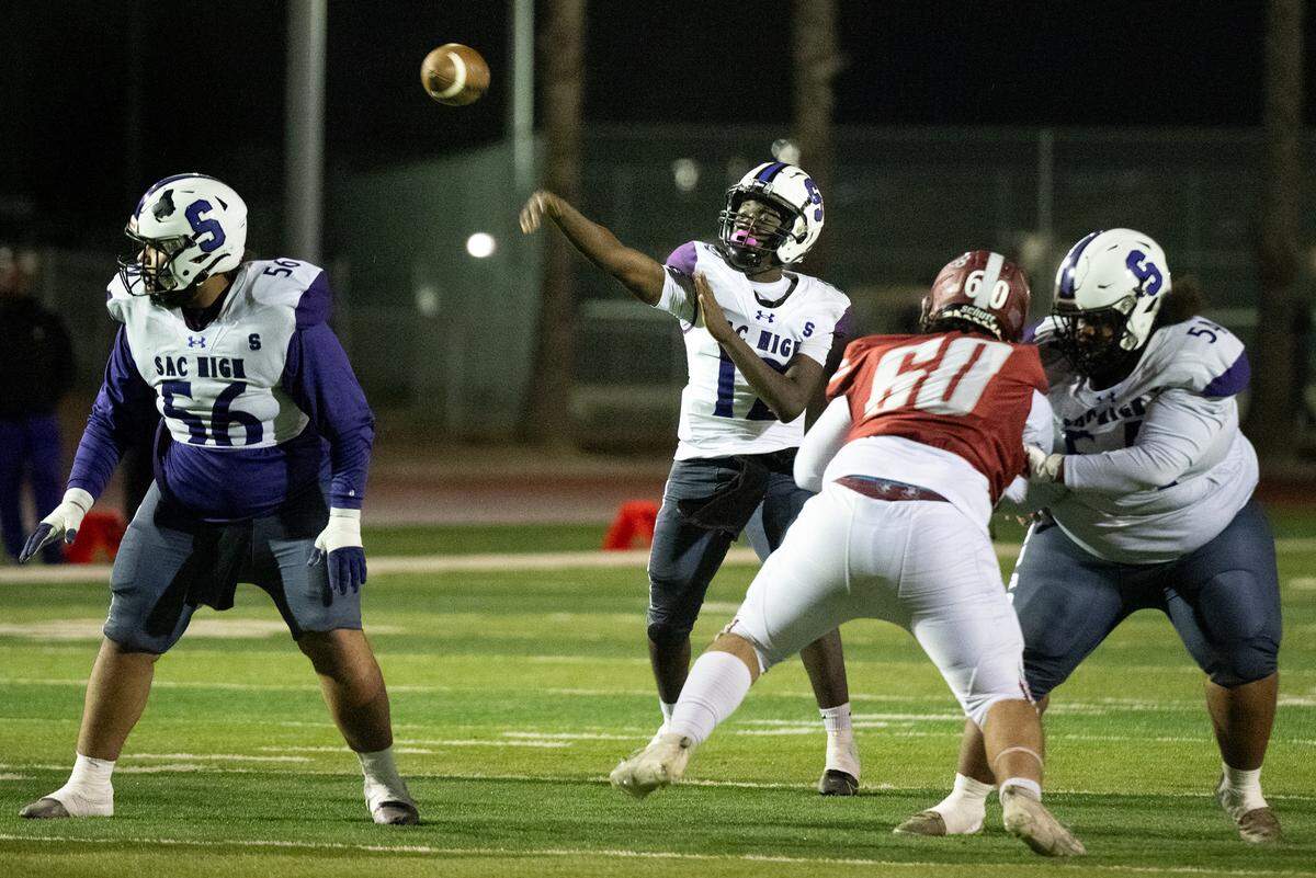 Sacramento’s Le’ron James Radcliffe makes a touchdown pass during the Sac-Joaquin Section Division IV semifinal game with Patterson at Patterson High School in Patterson, Friday, Nov. 22, 2024.