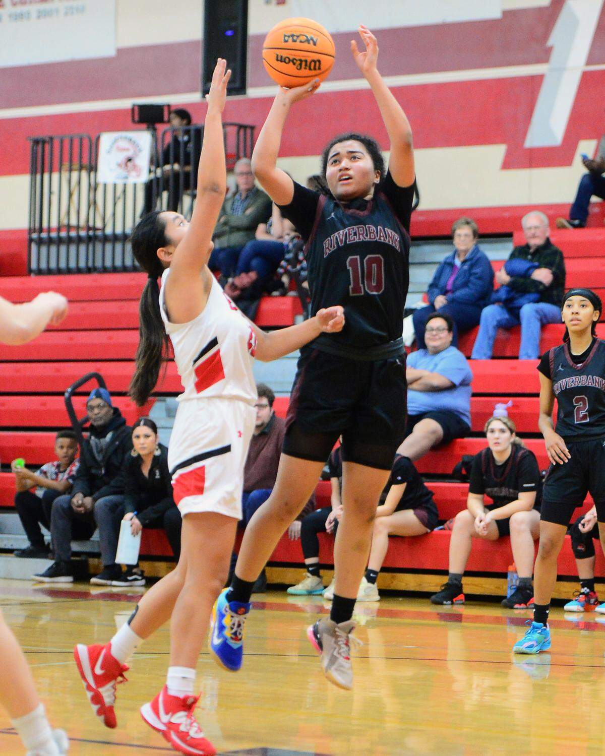 Riverbank guard Chancis Gamez (10) shots a fadeaway jumpshot during a game between Ripon High School and Riverbank High School at Ripon High School in Ripon California on January 5, 2023.