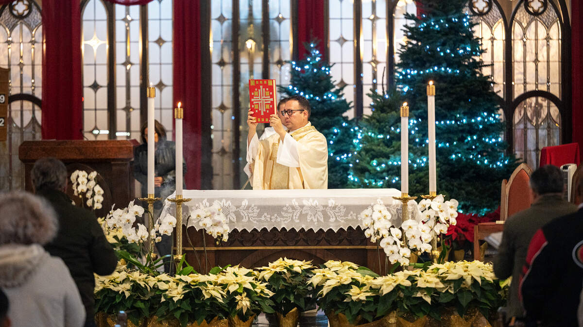 Father Adrian Cisneros conducts Christmas Mass at St. Stanislaus Catholic Church on Maze Boulevard in Modesto, Calif., Sunday, Dec. 25, 2022.