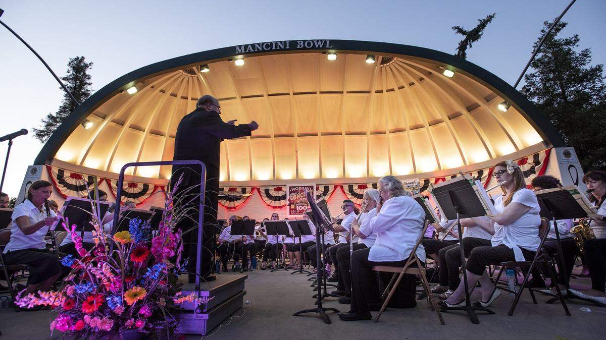 Conductor George Gardner leads MoBand in June of 2019, the 100th season of concert in the park series in Modesto.