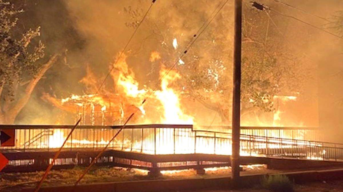 The American Legion Memorial Hall in Modesto’s Tuolumne River Regional Park burns on July 21, 2022.