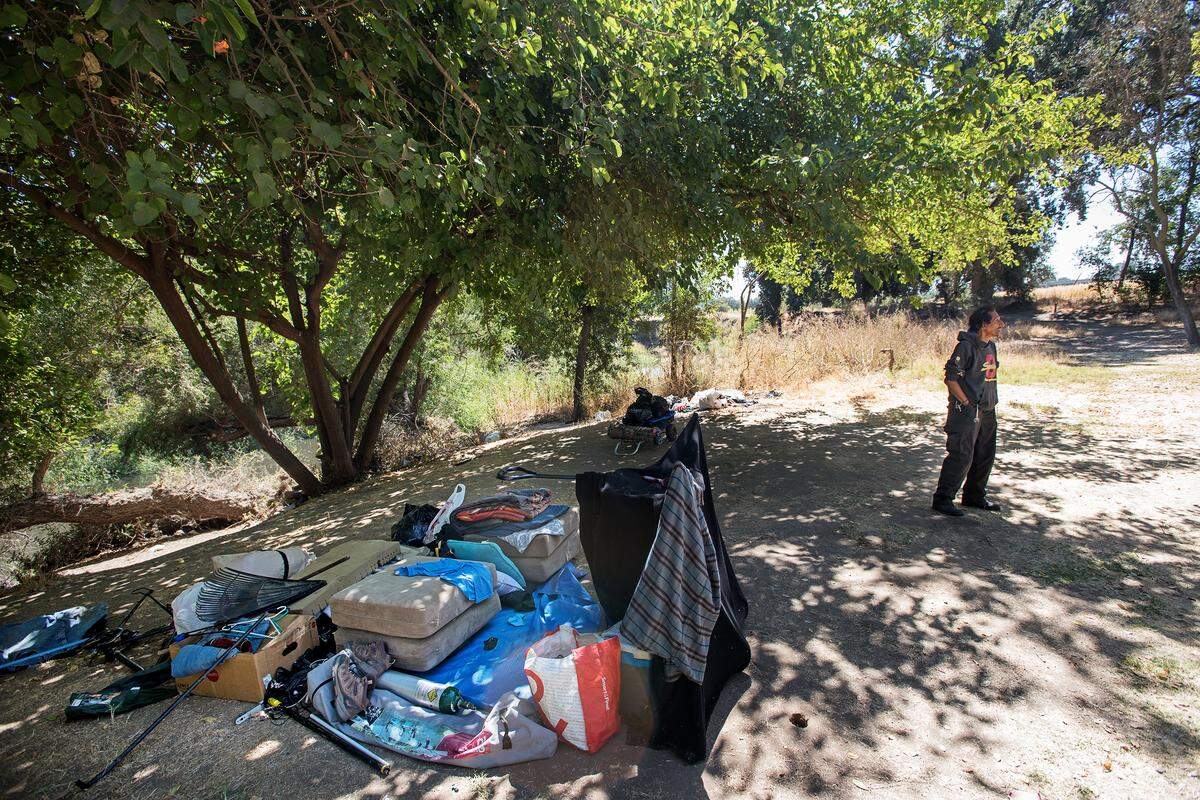 Homeless resident Edward Mendez has been camping at Beard Brook Park in Modesto, Calif. Photographed on Wednesday, Sept. 19, 2018. 