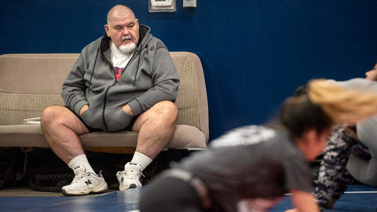 Head coach Doug Severe watches his wrestling team practice at Beyer High School in Modesto, Calif., on Monday, Dec. 20, 2021.