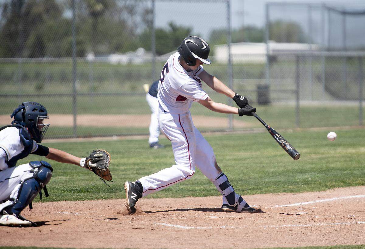 Beyer’s Daniel Lee lines a base hit during the Mark Dickens Tournament game with Central Catholic at Gregori High School in Salida, Calif., Tuesday, April 23, 2019. 