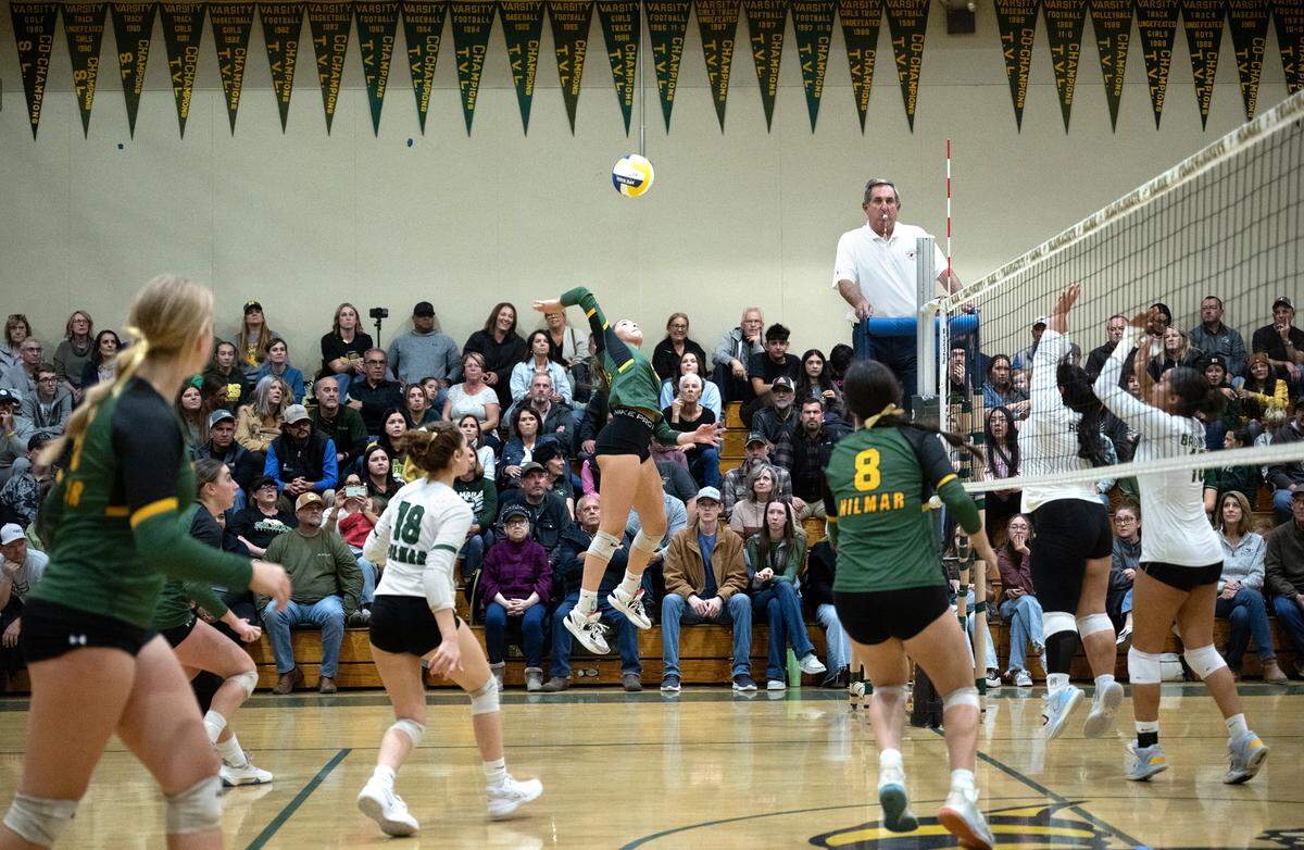 Hilmar’s Alyssa Colston spikes the ball during the CIF Northern California Division IV volleyball championship match with St. Patrick-St. Vincent of Vallejo at Hilmar High School in Hilmar, Tuesday, Nov. 19, 2024.