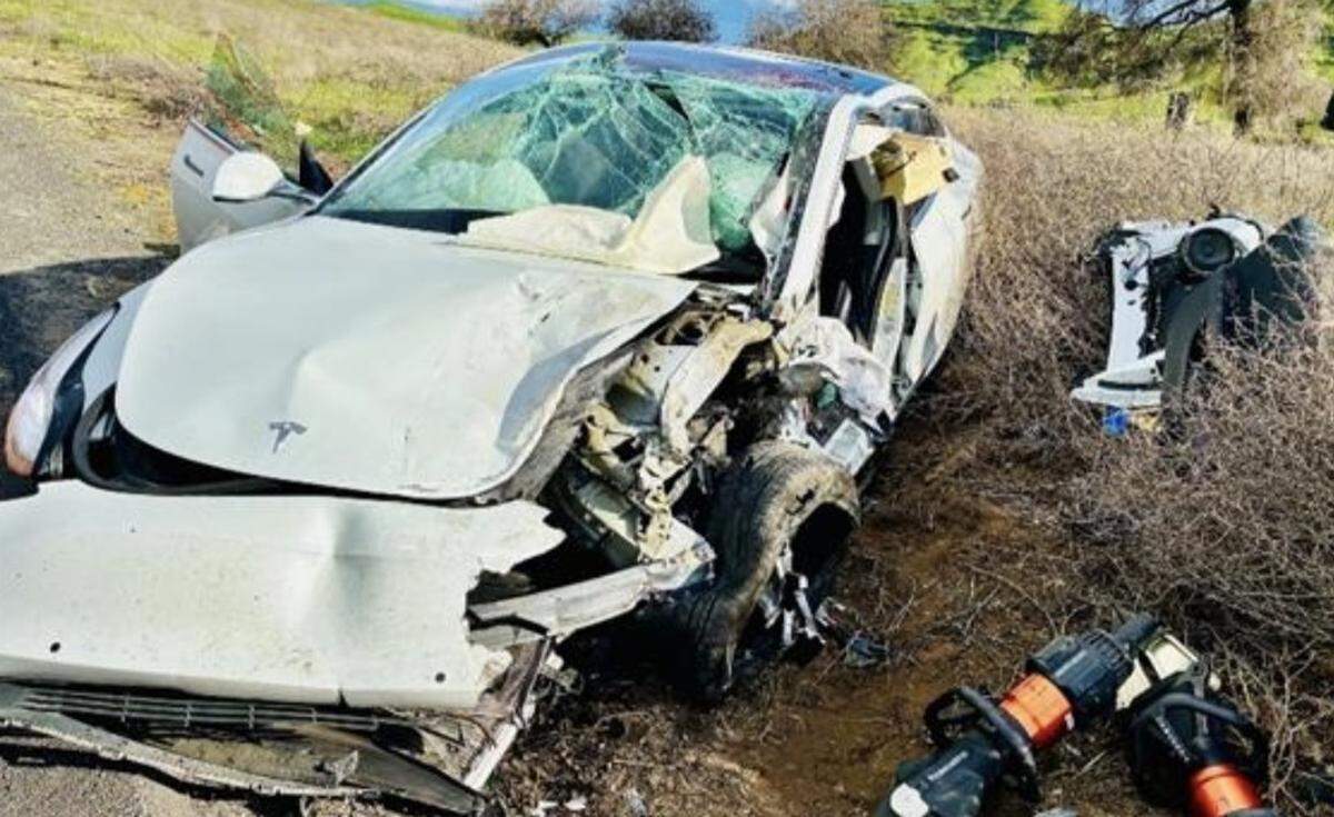 A 2019 Tesla sedan sits heavily damaged off State Route 108/120 west of Kennedy Road following a head-on collision Thursday afternoon, Feb. 19, 2026.