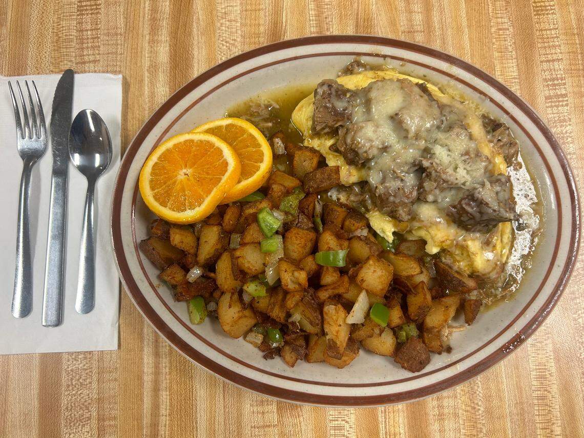 Old Mill’s slow-cooked pork in slightly spicy chili verde sauce is added to an omelet, topped with jack cheese and served with a choice of potatoes.