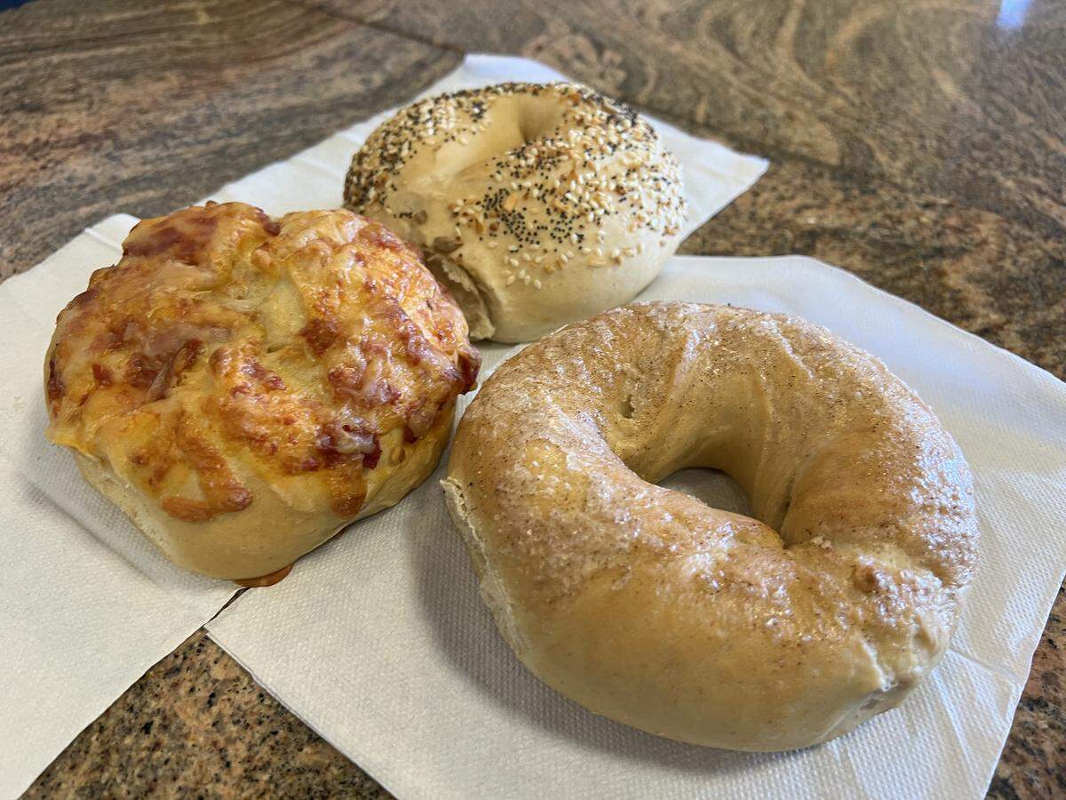 The everything, cinnamon crunch and pizza bagel from Posh Bagel in Modesto.