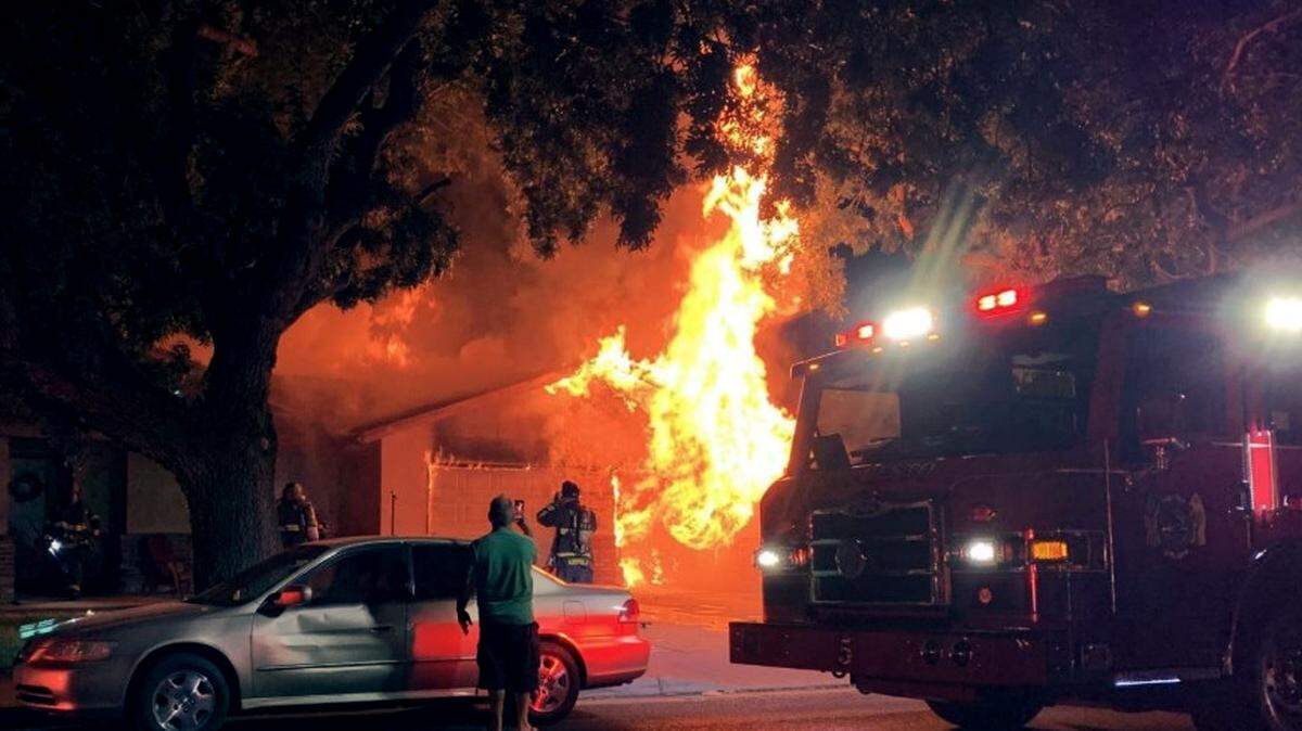 Six people were displaced from a duplex on the 1400 block of Floyd avenue in Modesto, Calif. after a fire spread from a garage into living areas of other units on Tuesday night, August 13, 2019.