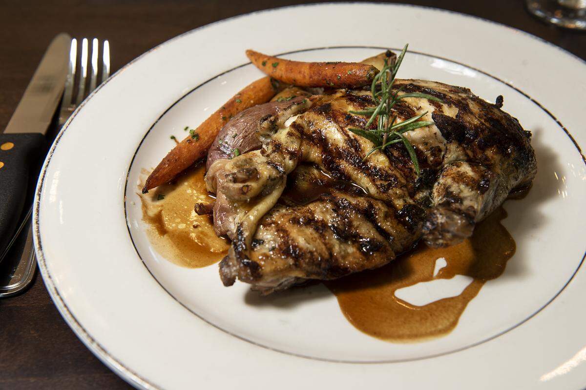 Grilled brick half chicken prepared during preview night at the new Fina restaurant in Ripon, Calif., Friday, Aug. 2, 2019.