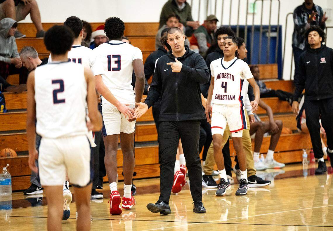 Modesto Christian coach Brice Fantazia motions to his players on a timeout during the game with Berkeley at Modesto Christian High School in Salida, Calif., Saturday, Dec. 16, 2023.