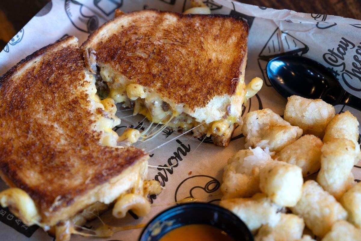 Best of Both Worlds sandwich (grilled cheese with short ribs and mac and cheese baked all together) at I Heart Mac & Cheese in Turlock, Calif., Thursday, August 24, 2023.