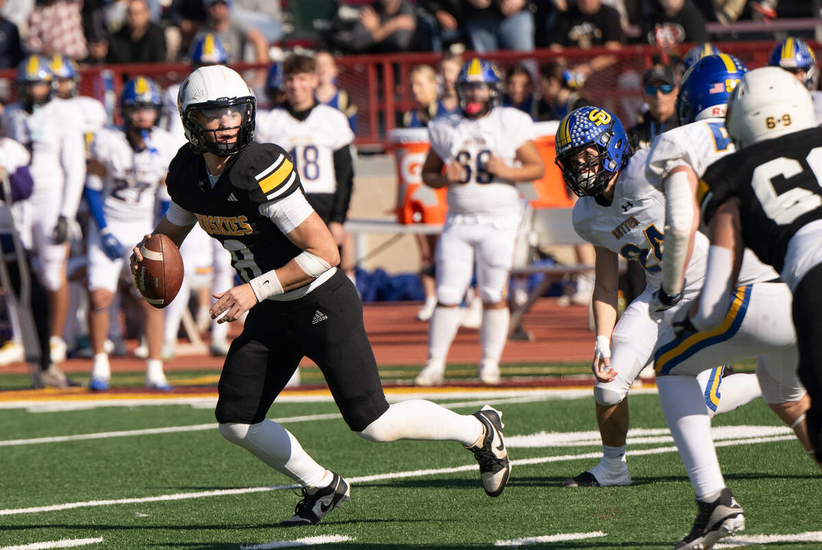 Hughson quarterback Robert McDaniel looks to pass the ball during the Sac-Joaquin Section Division 5 championship game with Sutter at Sacramento City College in Sacramento, Saturday, Nov. 30, 2024.