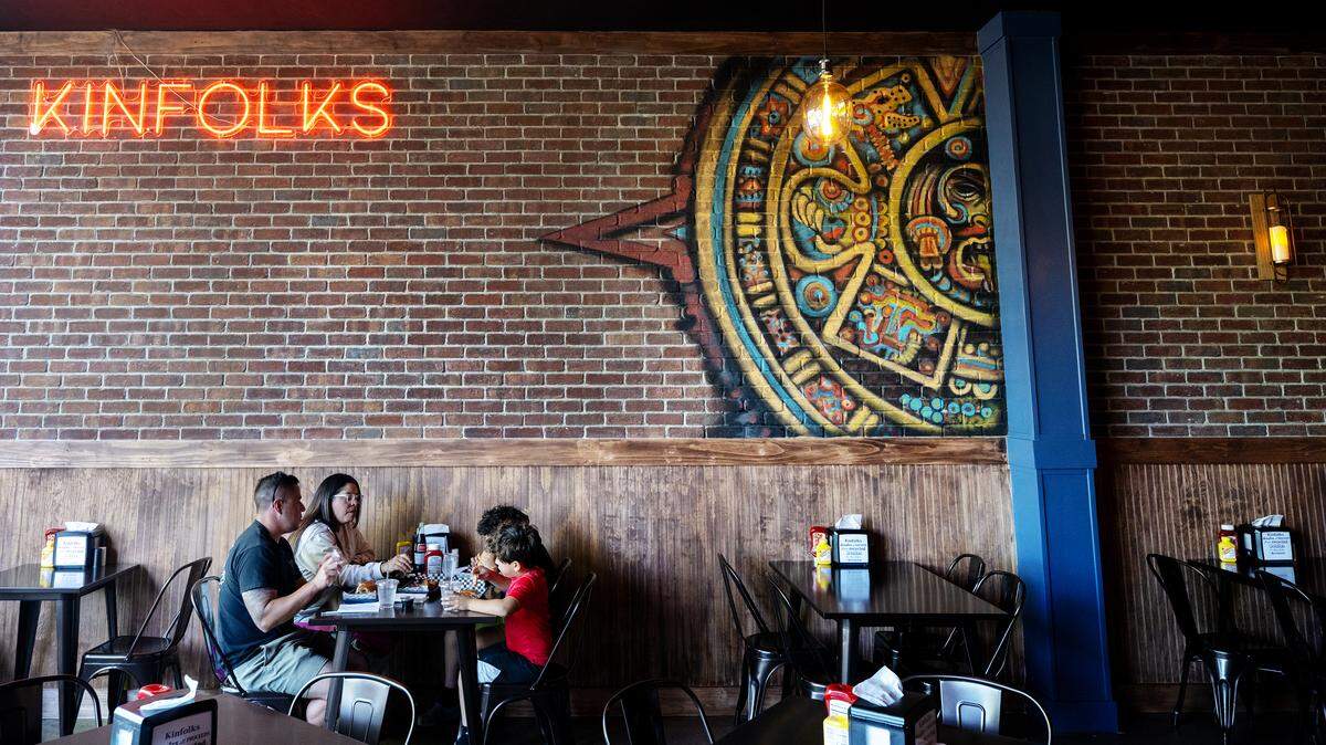 Marco and Roxy Diaz eat lunch with sons Lucca and Donovan at Kinfolks Flatstone Grill in Riverbank on Friday, April 3, 2026. 