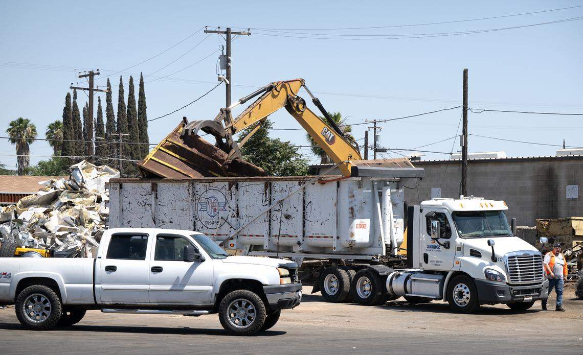 Scrap metals are loaded into a transport truck at Universal Service Recycling in Modesto, Wednesday, June 25, 2025.