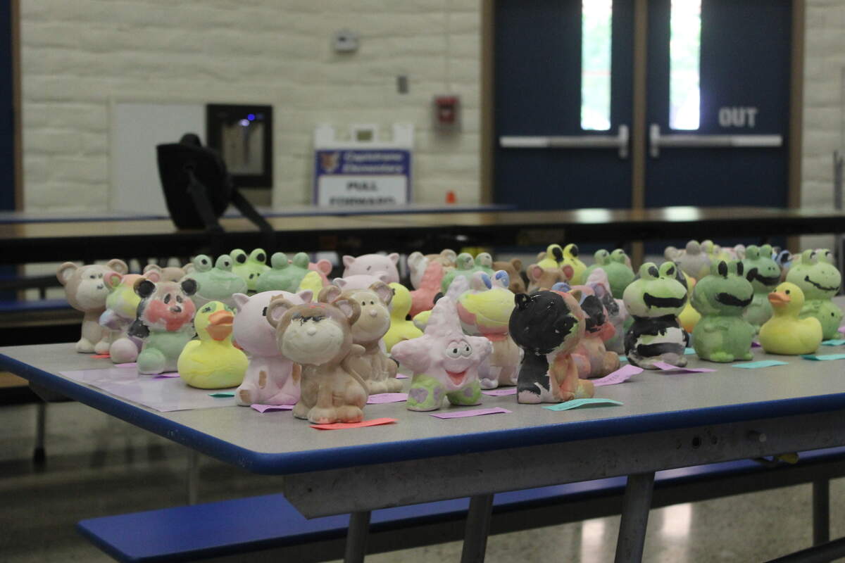One of the activities students participated in was painting ceramic clay animals.