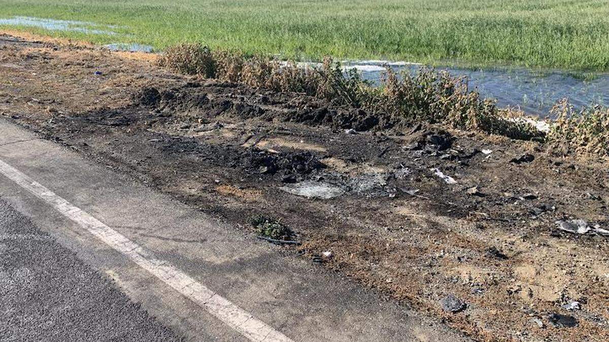 The scene of a fiery crash on River Road north of Newman on Monday, Feb. 21, 2022.