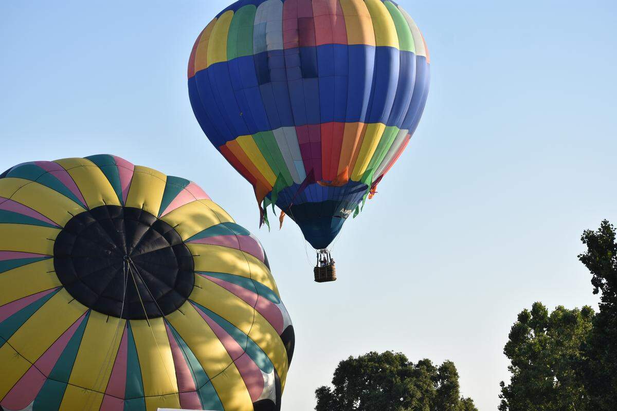 The first Skies the Limit hot-air balloon festival was held at River Bluff Regional Park in Ceres, California, on Saturday, June 17, 2023. Ten teams of balloonists took part. Spectators had to be there early to witness the launches, as most occurred between 6 and 7 a.m.