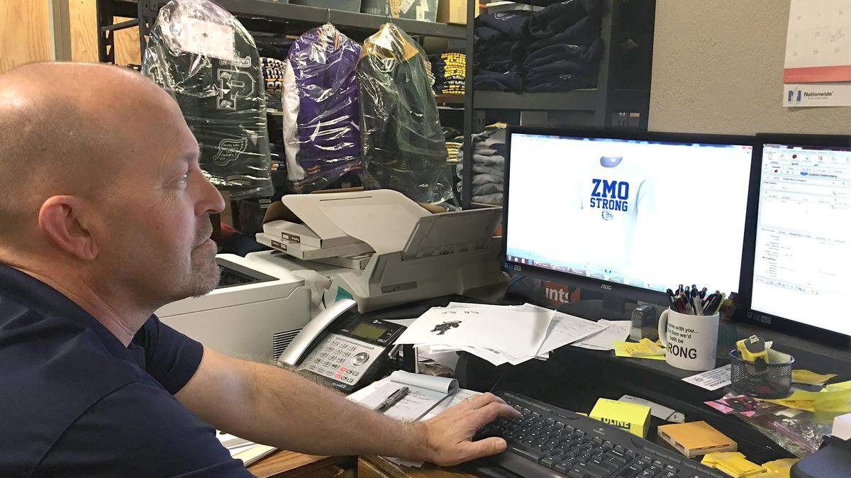Greg Crivelli of Crivelli's Shirts & More designs the ZMO shirts Wednesday, January 24, 2018 to be sold at Turlock High School in honor of Zach Moore. Moore, 20yrs and a Turlock High graduate was killed in a car accident last week.