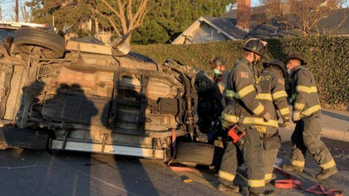 Modesto firefighters work the scene of a fatal crash on Kansas Avenue in Modesto on Saturday, Feb. 6, 2021.