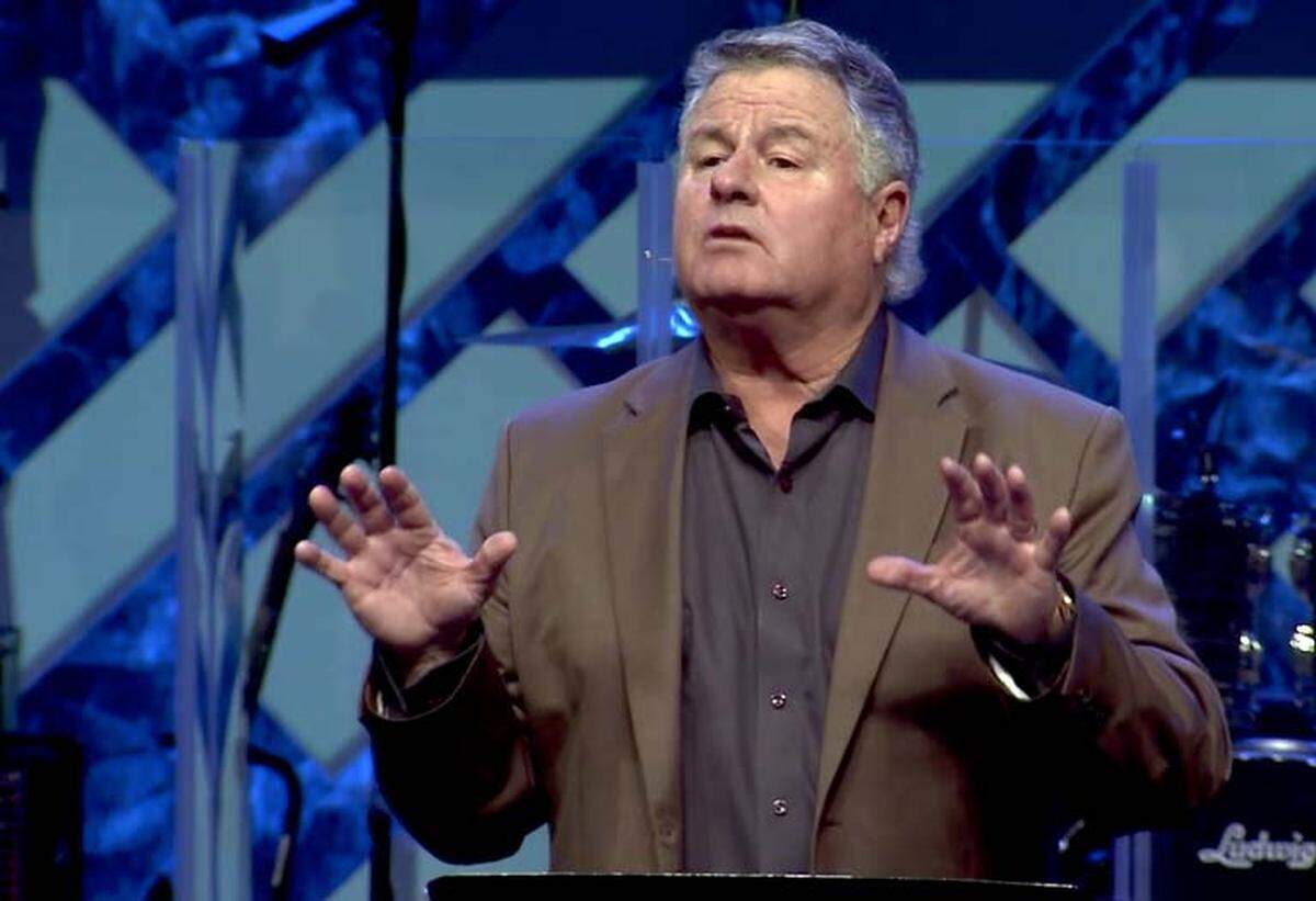 Les Hughey, former senior pastor at Highlands Church is pictured during a sermon at the church in Scottsdale, Arizona on December 17, 2017.