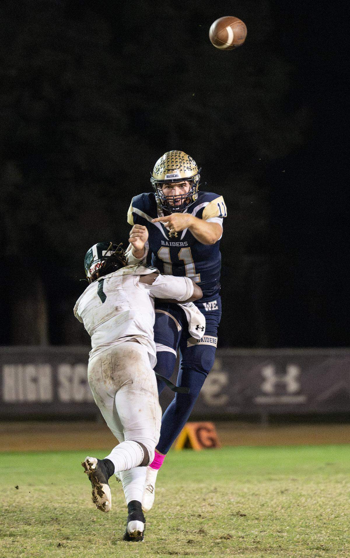Central Catholic quarterback Tyler Wentworth releases the ball under pressure from Manteca’s Bryson Davis during the Valley Oak League game at Central Catholic High School in Modesto, Calif., Friday, Oct. 20, 2023.