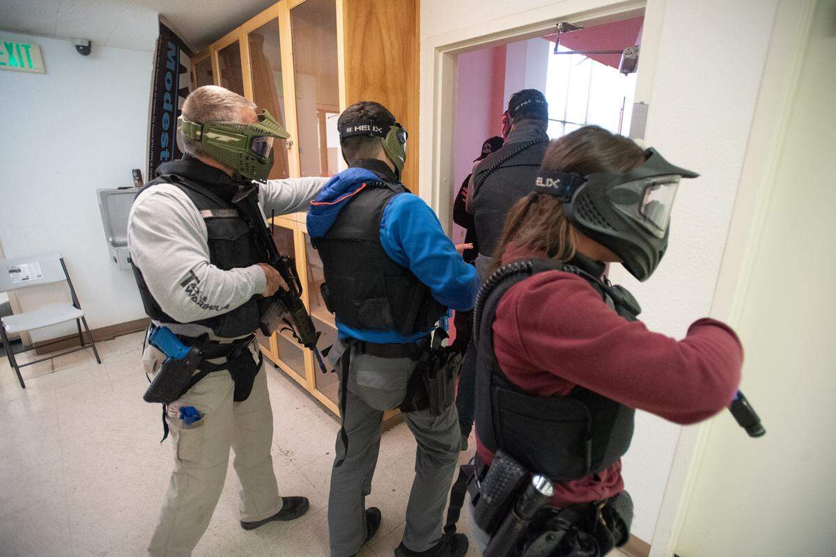 Modesto Police officers clear the building during an active shooter training scenario in Modesto, Calif., Wednesday, Feb. 15, 2023.