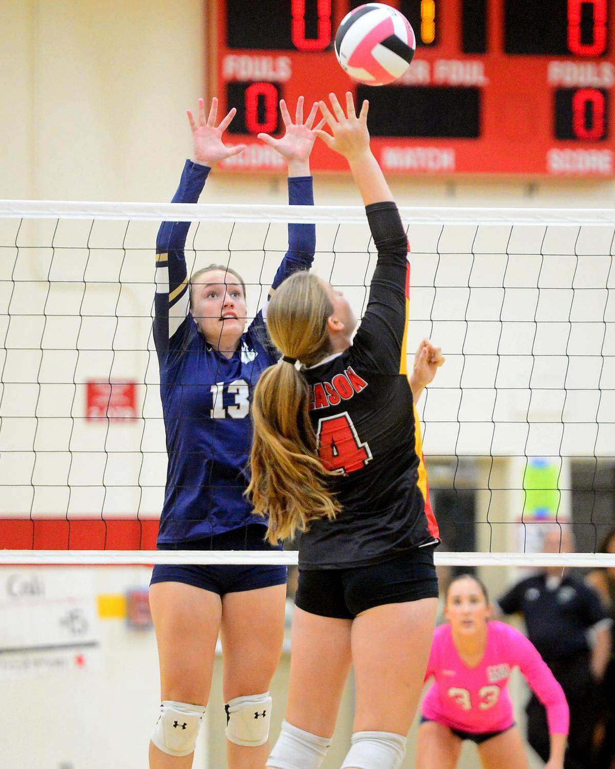 Central Catholic’s Marie Wildenberg (13) leaps to block a ball during a game between Oakdale and Central Catholic at Oakdale High School in Oakdale, Calif. on Thursday, Oct. 17, 2024.&nbsp;