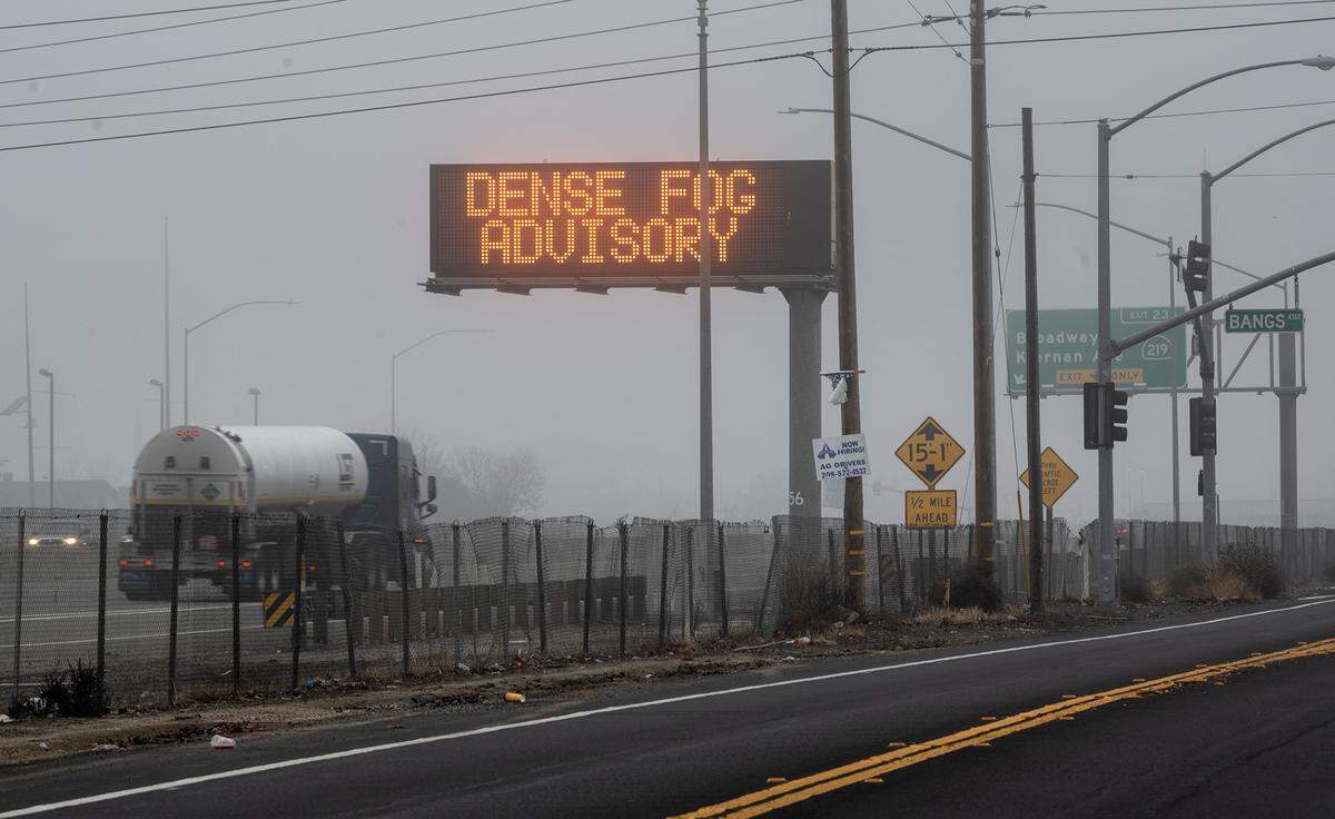 Drivers on Highway 99 are alerted about adverse weather in Salida, Calif., Sunday, Dec. 25, 2022. 