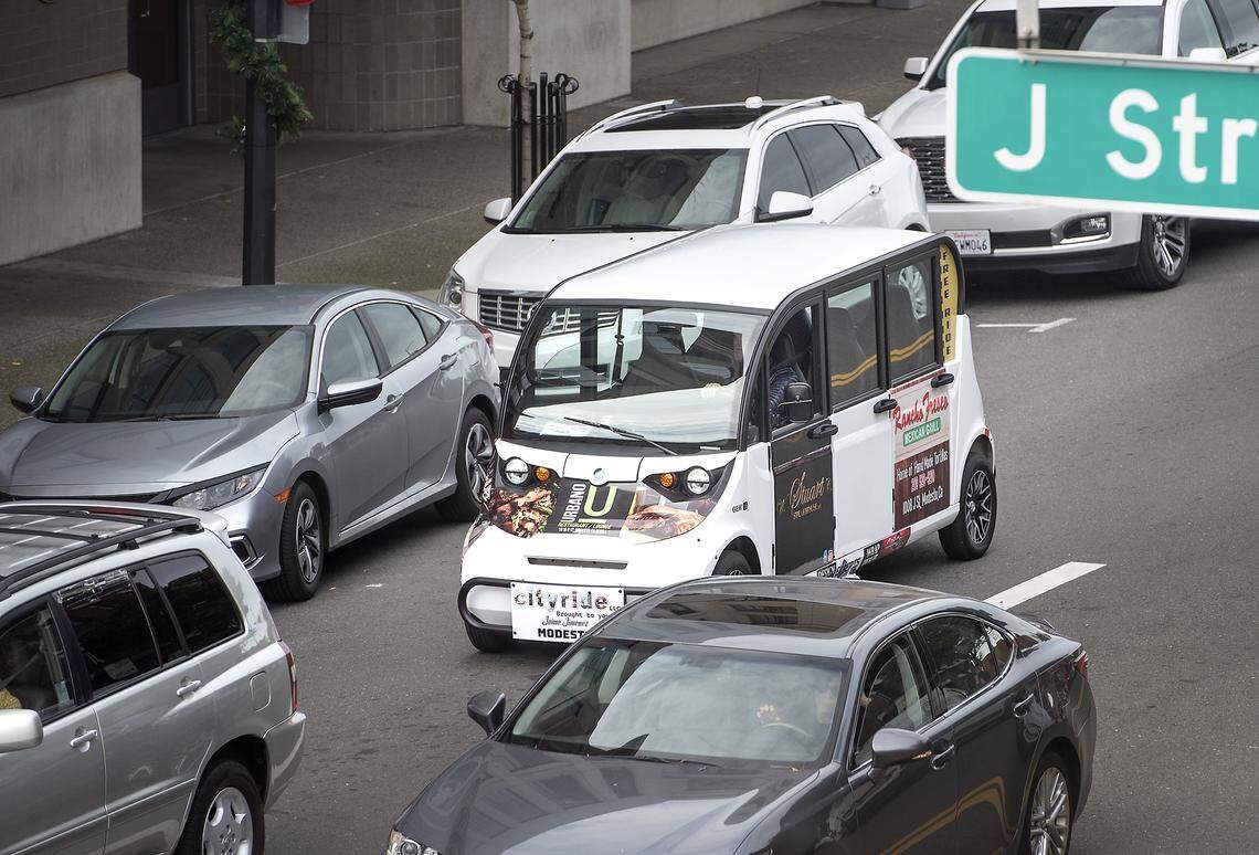 Cityride car transports a rider on J Street in Modesto, Calif., on Thursday, Dec. 12, 2019.