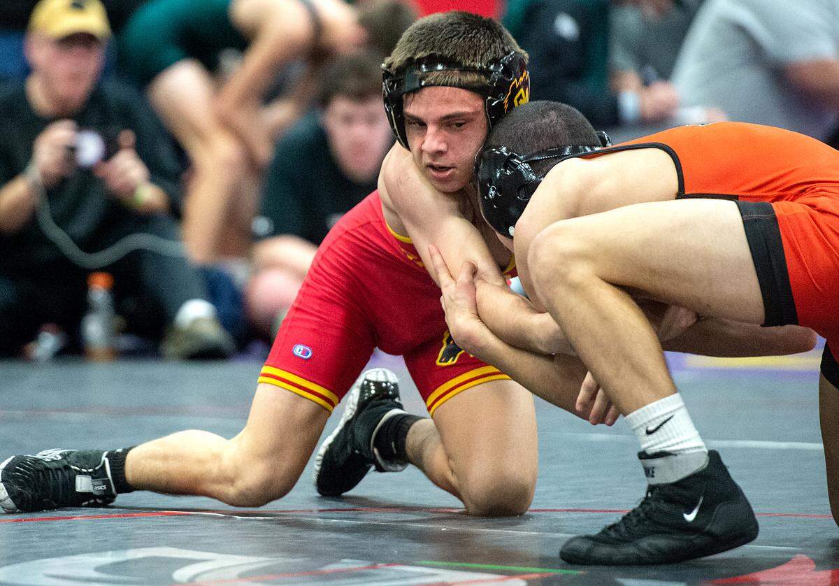 Oakdale Logan Thomas and Vacaville’s Wyatt Sandoval wrestle in the 113 lb. match during the D1 Sac-Joaquin Section team duals wrestling championship at Lincoln High School in Stockton, Calif., Saturday, Jan. 28, 2023.