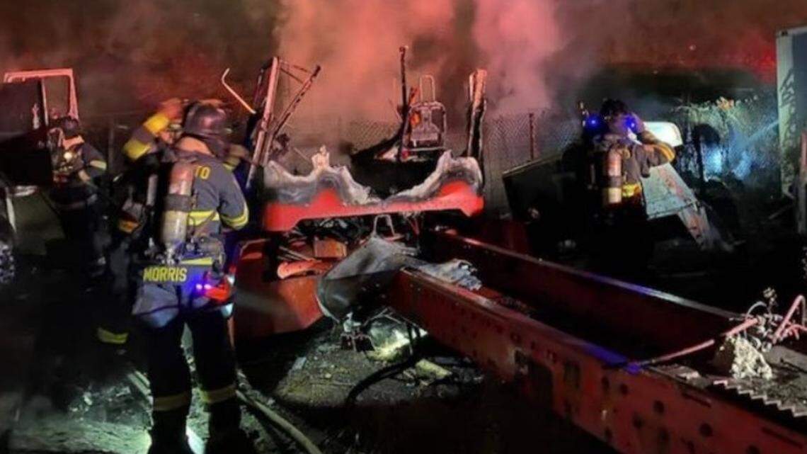 Modesto and Ceres fire crews fought a blaze Sunday night, Nov. 15, 2020, that spread from a homeless camp on South Ninth Street to an adjacent truck yard.