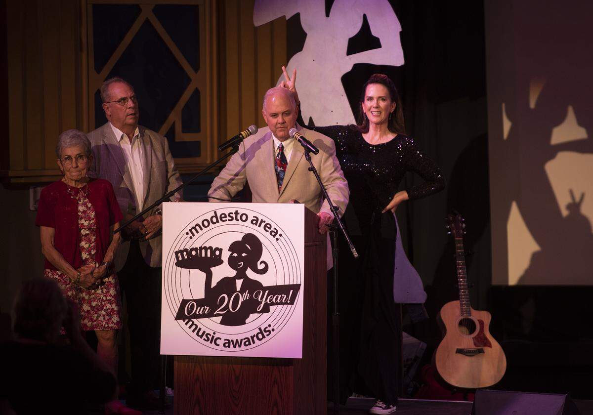 Kristi Ah You jokes with mayor Ted Brandvold as he addresses the crowd during the Modesto Area Music Awards at The State Theatre in Modesto, Calif., Tuesday, Oct. 15, 2019.