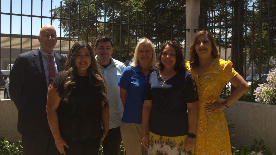 Jeffrey Lewis, president and CEO of EMC Health Foundation, (pictured far left), poses for a photo with Linda Stuhmer, president and CEO of EMC Health Inc., (center), and recipents of a behavioral health fellowship that honors her. The recipents from left to right are: Brenna Torres, Sergio Perez, Lina Maria Villegas, Lizbet Delgadillo and Marina Petersen, who is not pictured.