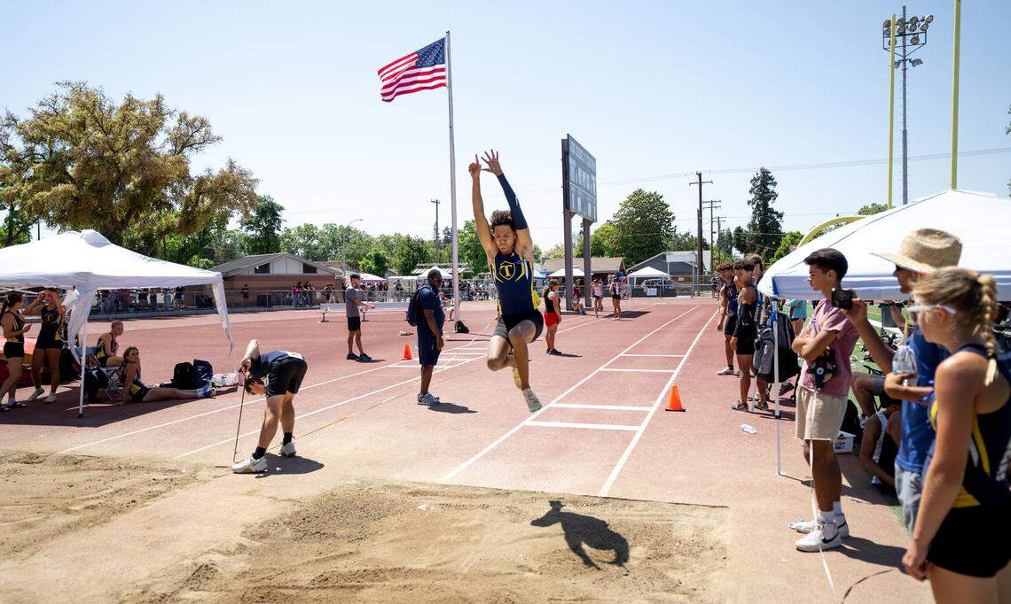Turlock’s Cash Burton won the long jump competition in the Central California Athletic League track and field championships at Turlock High School in Turlock, Friday, May 2, 2025. Burton’s wing jump was 21’-03.50”.