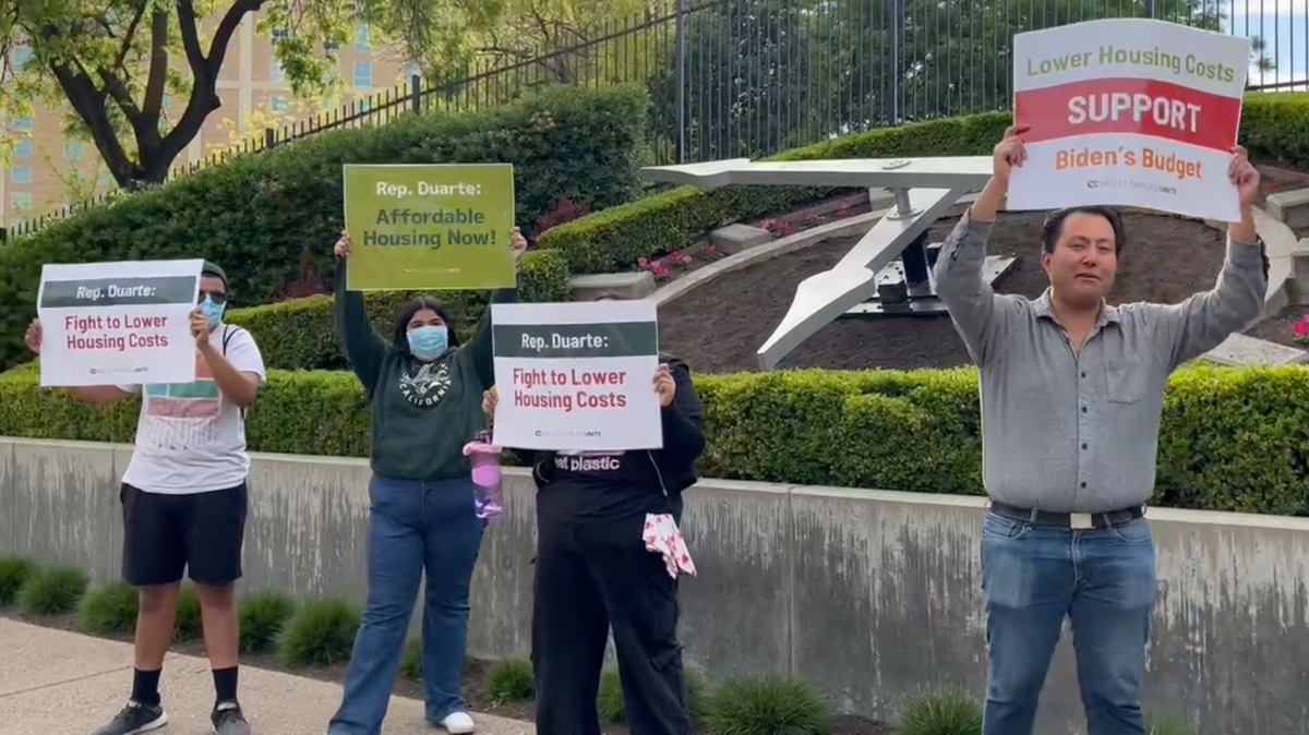 Rally participants chant for Rep. John Duarte to support the Biden administration’s budget on April 25, 2024.