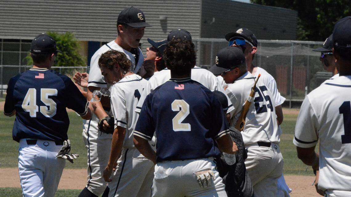 Central Catholic baseball players celebrate after the Raiders beat Manteca, 8-7, in the Valley Oak League Championship on Thursday, June 3, 2021 in Modesto, California.