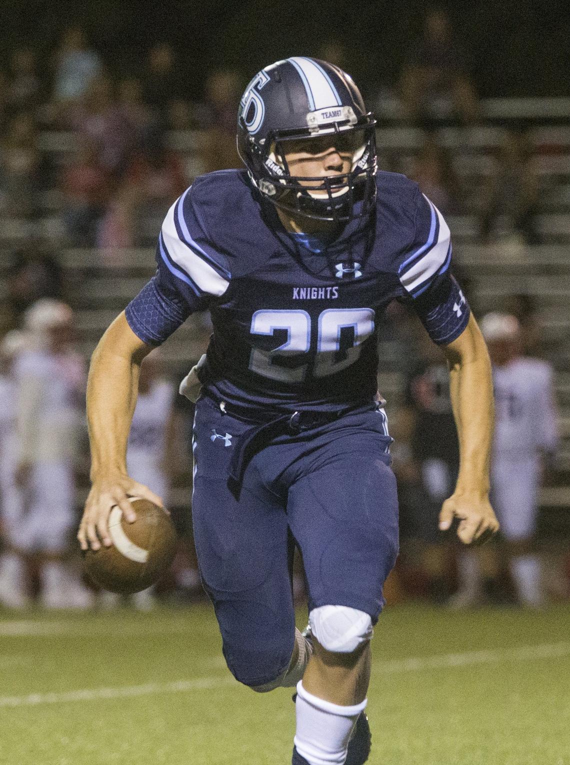 Beau Green, runs the ball as East Union. Downey High took on East Union Friday Aug. 17, 2018.