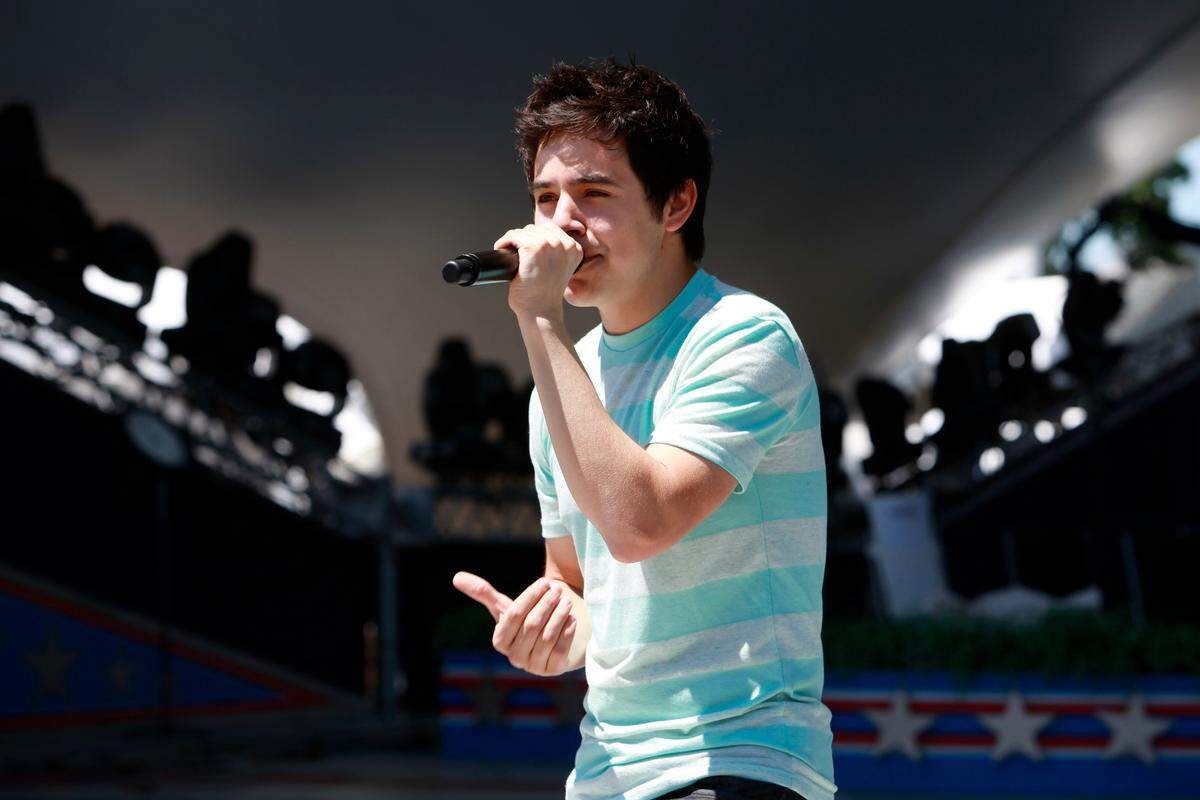 Singer David Archuleta, 19, rehearses “The Star Spangled Banner” for the independence day concert, “A Capitol Fourth,” by the U.S. Capitol in Washington, on Saturday, July 3, 2010. (AP Photo/Jacquelyn Martin)