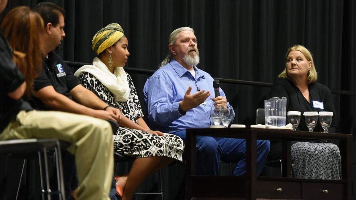 At a Focus on Prevention event at Modesto Centre Plaza on Oct. 1, 2015, Randy Limburg, center, speaks about his personal experience with being homeless.